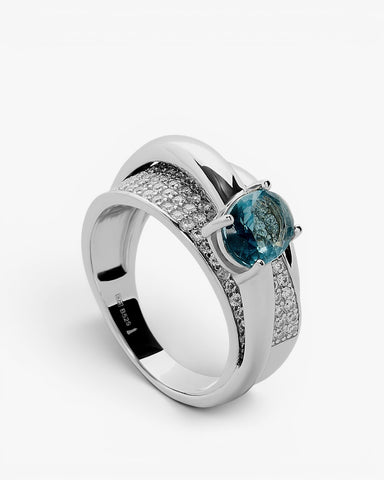Anillo de plata enredados con circonita tono aqua
