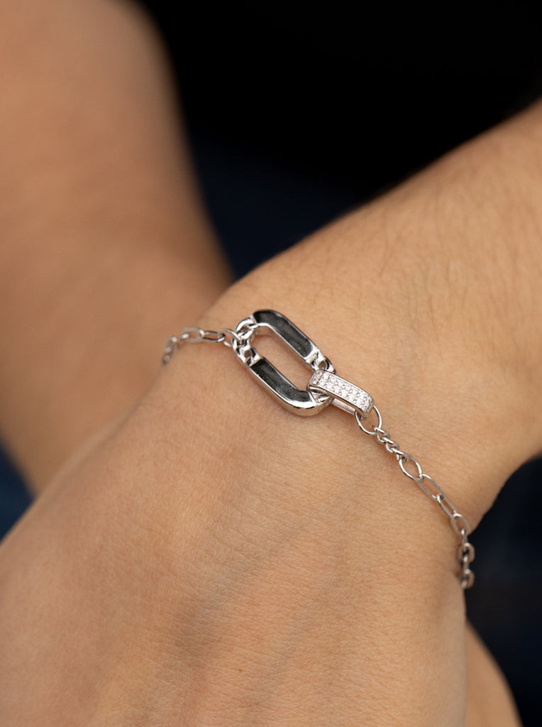 Silver link bracelet with centerpiece set with cubic zirconia