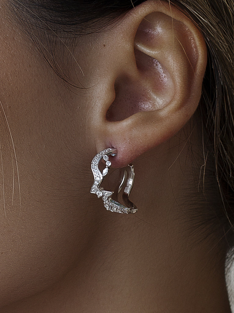 Zigzag knot-style hoop earrings with cubic zirconia