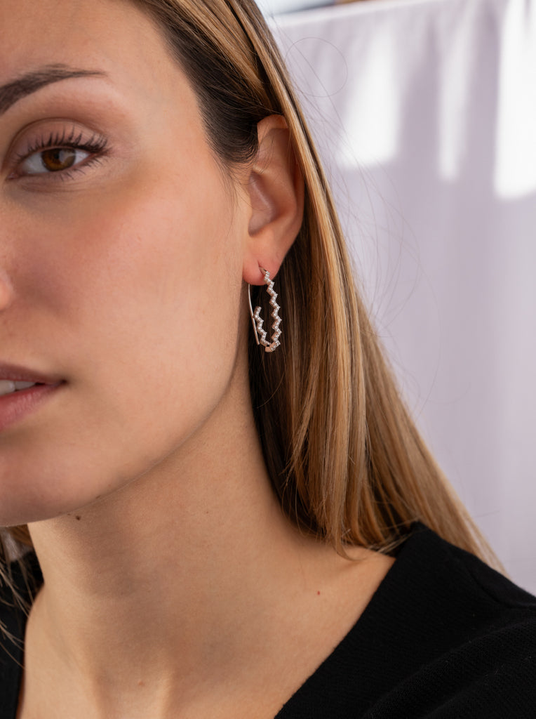 Boucles d'oreilles rigides originales à motif en zigzag