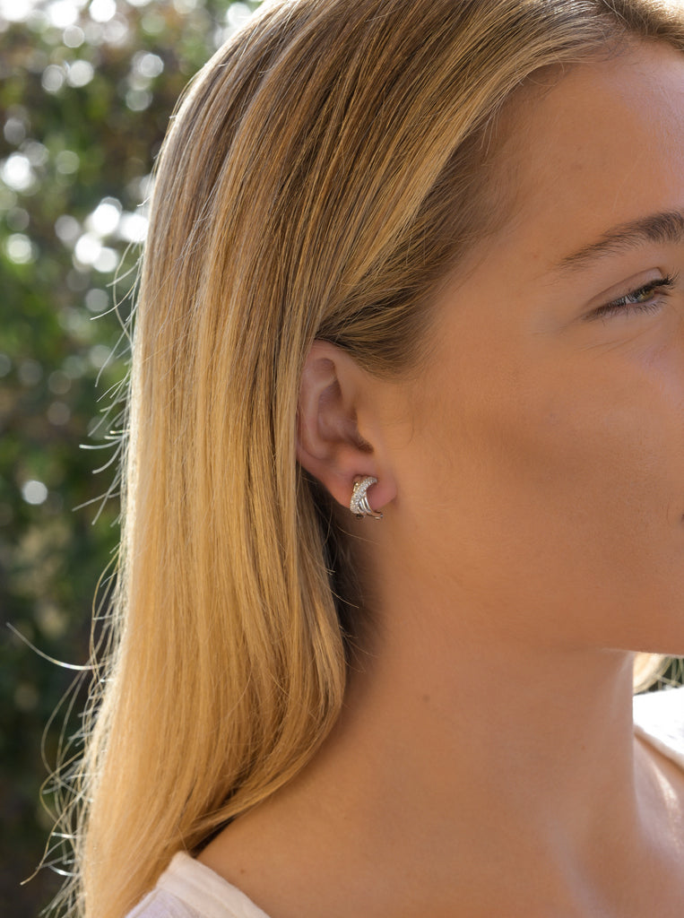Omega-clasp cross earrings with cubic zirconia