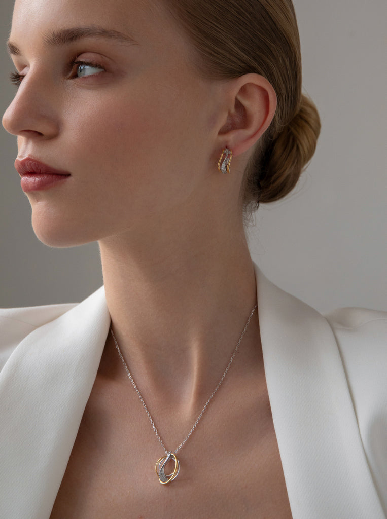 collier argent bicolore avec zircons entrelacé