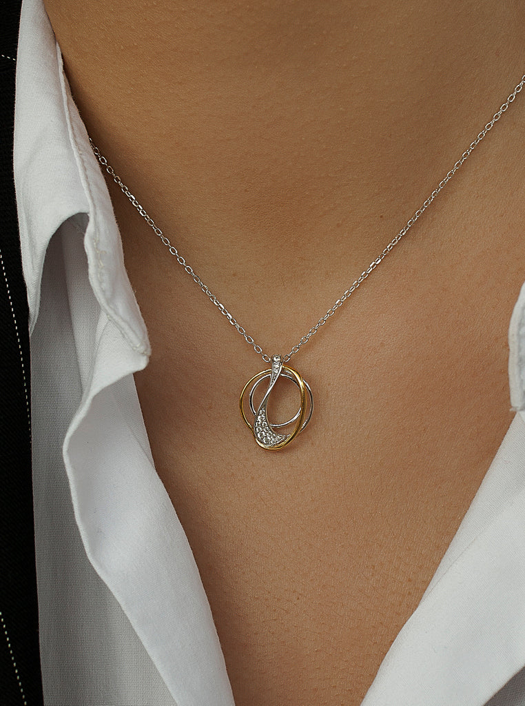 Two-tone silver necklace with intertwined cubic zirconia