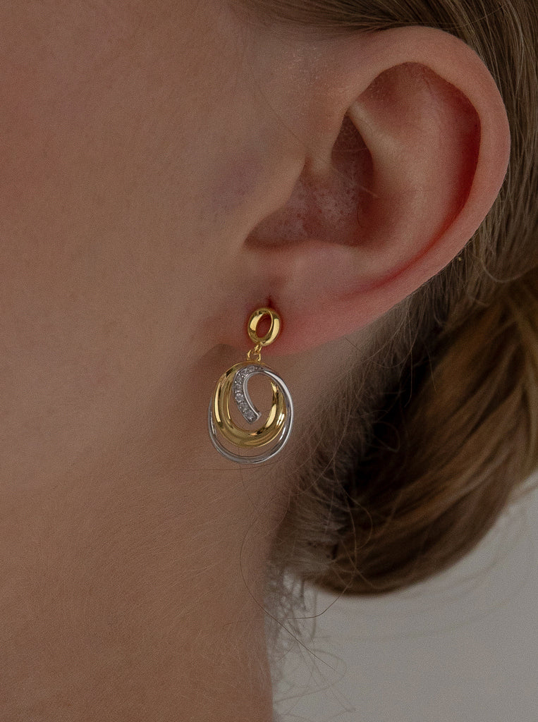 Two-tone silver dangle earrings with cubic zirconia
