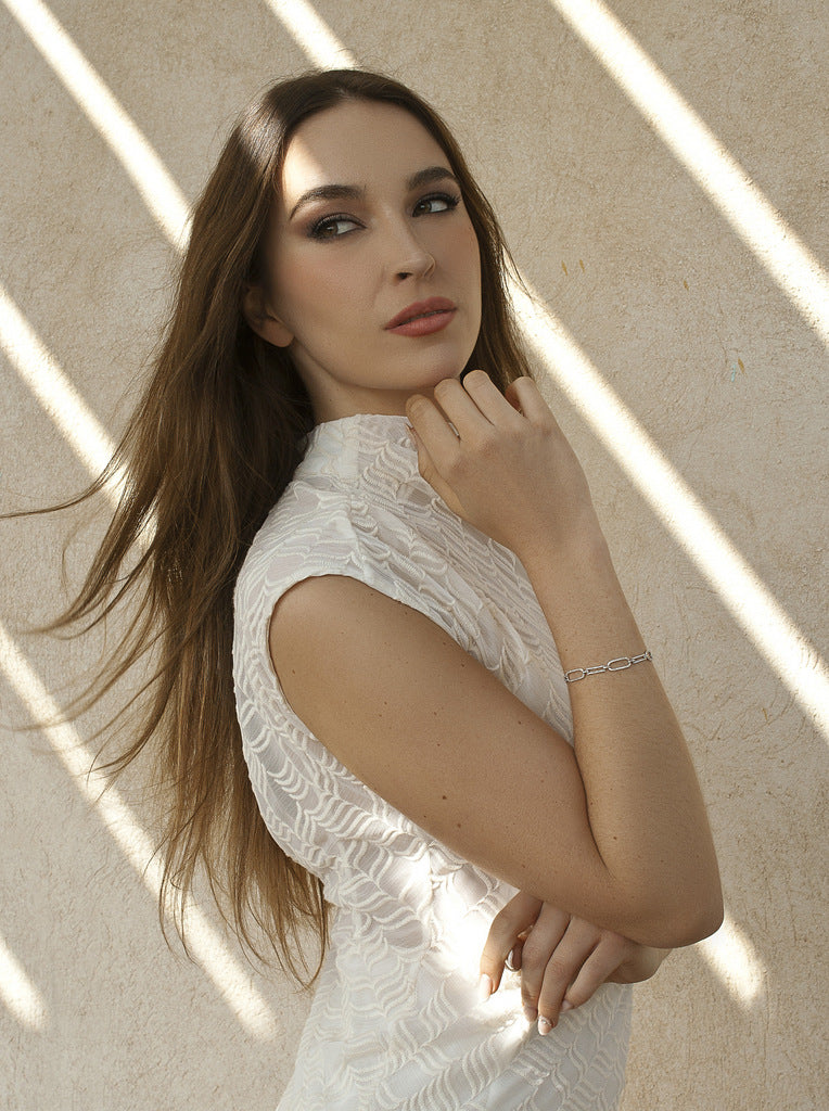 Silver link bracelets with oval-shaped cubic zirconia
