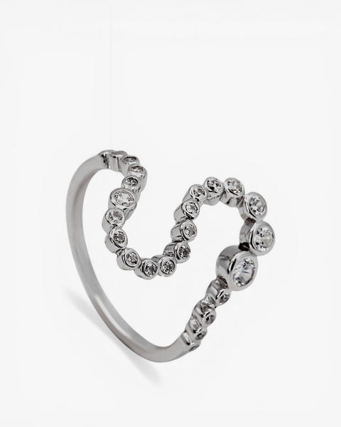 Silver ring in the shape of an S with cubic zirconia all around the edge