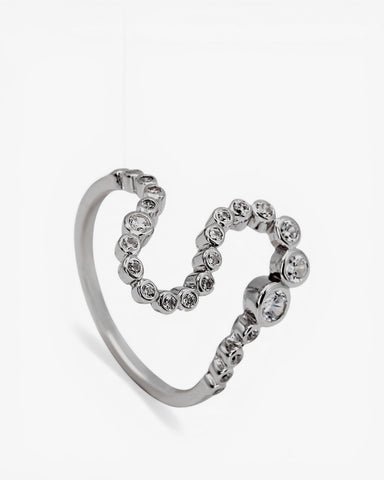 Anillo de plata en forma de s y circonitas en todo el contorno