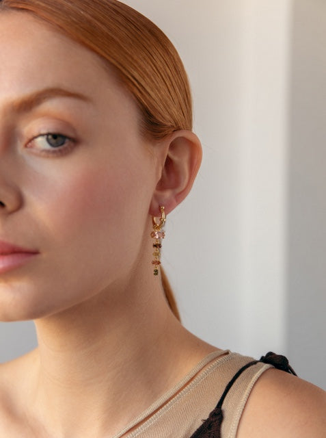 Silver earrings with colored stones in shades of brown and pink
