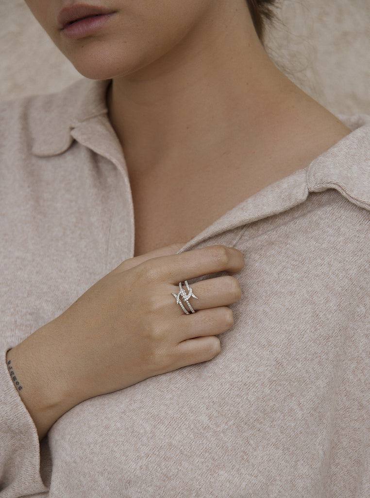 Silver ring with cubic zirconia wire design