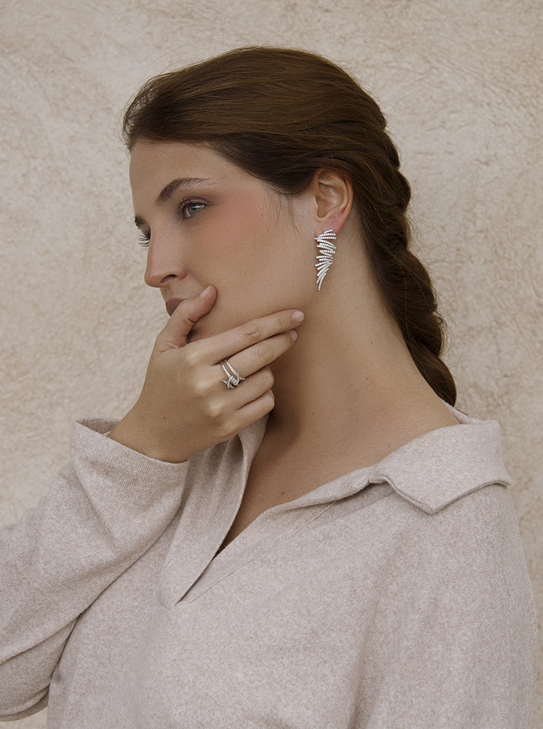 Silver ring with cubic zirconia wire design