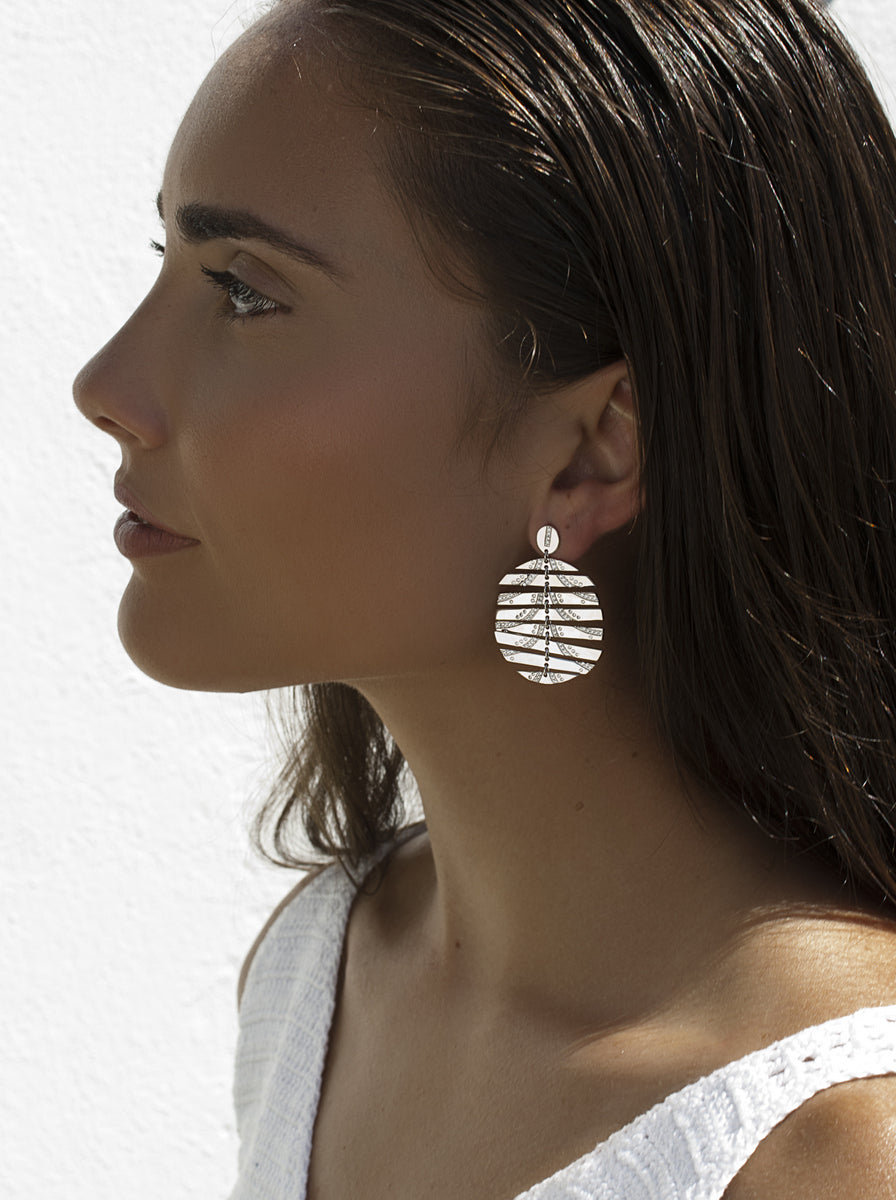 Pendientes circulares con diseño circular movible con circonitas