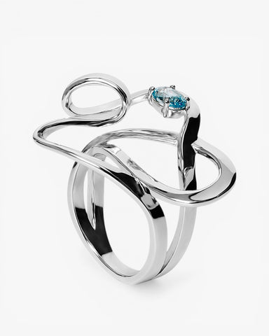 Anillo de plata en espiral con piedra en tono azul
