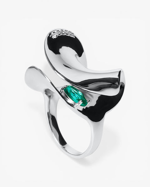 Anillo abierto de plata con zafiro azul y circonitas