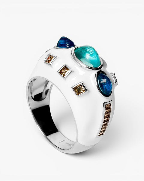 Anillo de plata con esmalte blanco  piedras azules y circonitas