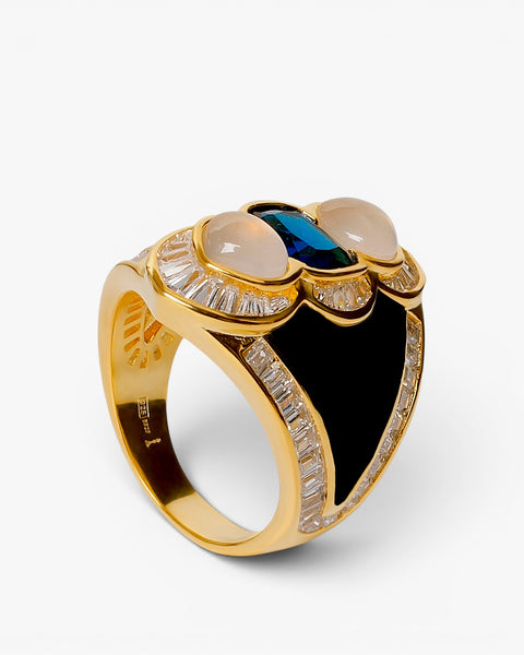 Anillo de plata dorado con esmalte negro  piedra azul y circonitas