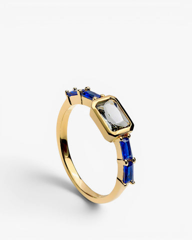 Anillo de plata de ley 925 con piedra rectangular y circonitas baguette azules