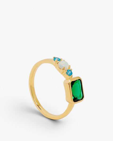 Bague en argent avec opale, pierres bleues et pierre verte rectangulaire