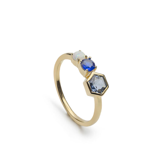 Anillo de plata de ley dorada con piedra hexagonal azul y ópalo