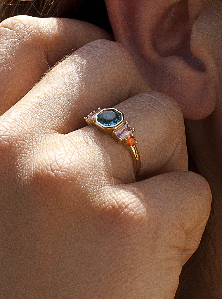 Gold-plated sterling silver ring with octagonal blue pink and orange stones