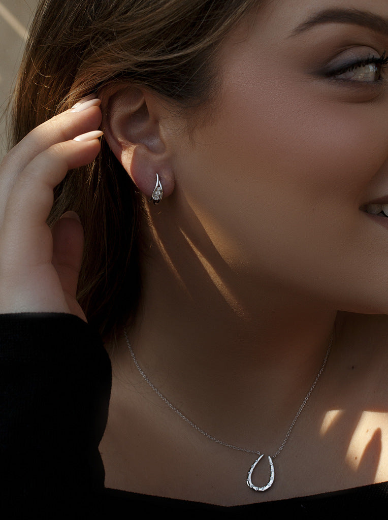 Pendientes pequeños de plata con circonitas forma ovalada