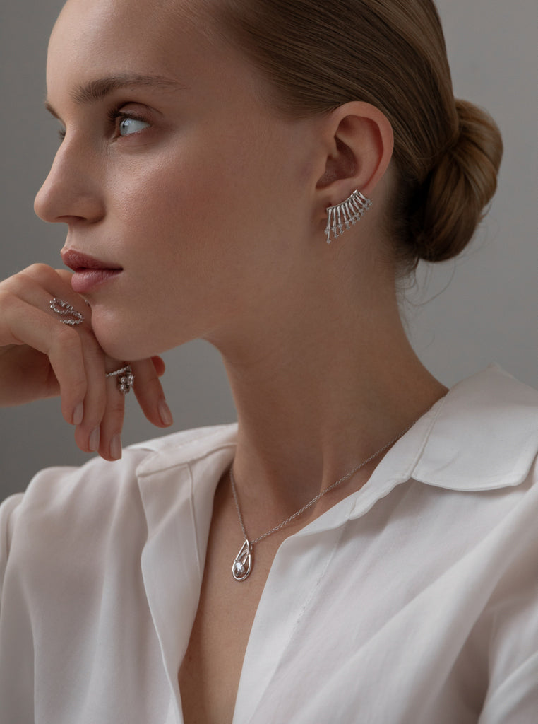 Small silver necklace with teardrop-shaped cubic zirconia