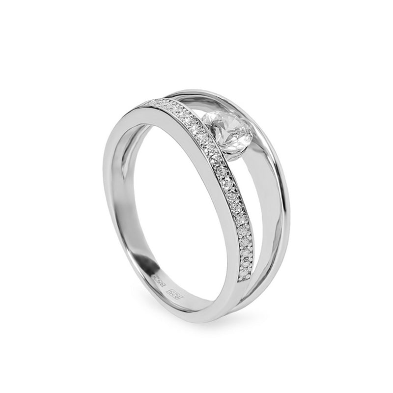 Anillo con circonita redonda central y doble rail