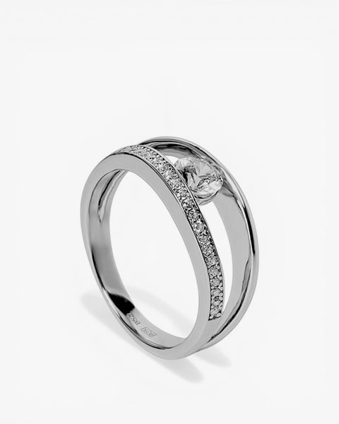 Anillo con circonita redonda central y doble rail