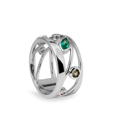 Anillo de plata cruzado con circonitas en tonos verde y champagne
