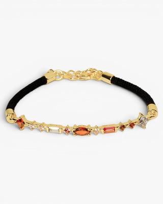 Pulsera de plata con piedras naranjas y cordón negro