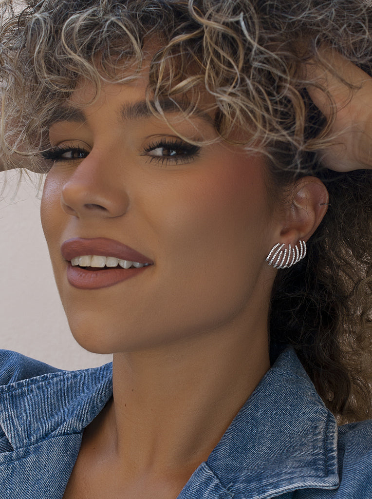 Pendientes originales en plata con diseño curvo de garras