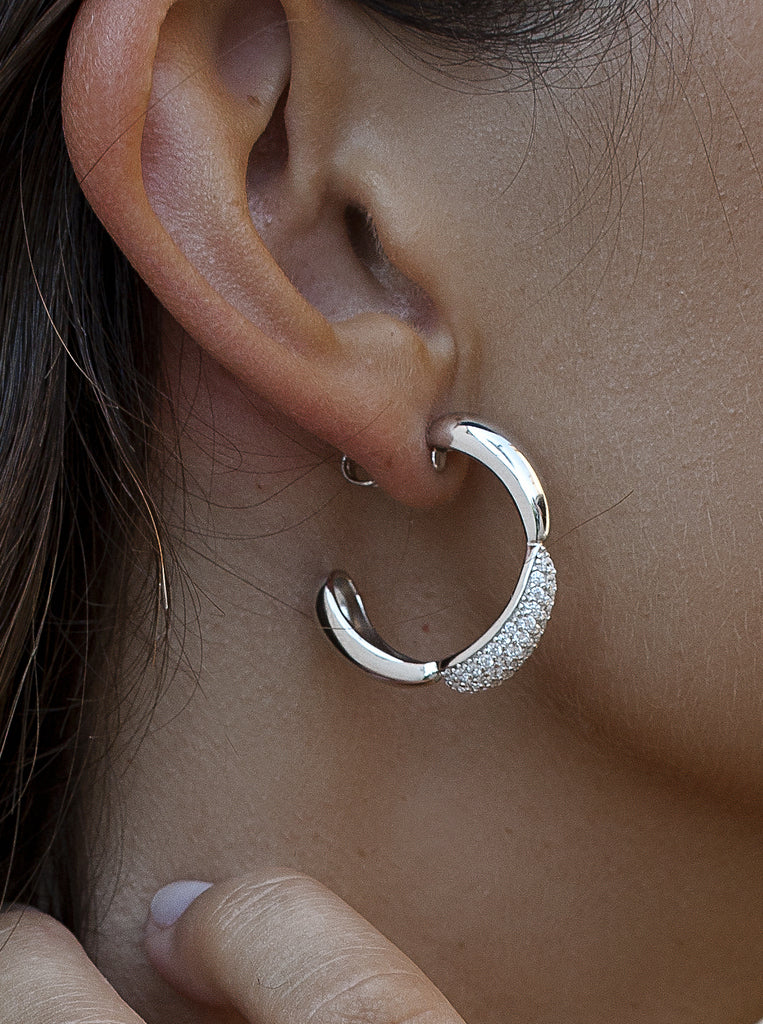Silver hoop earrings with puffy effect cubic zirconia