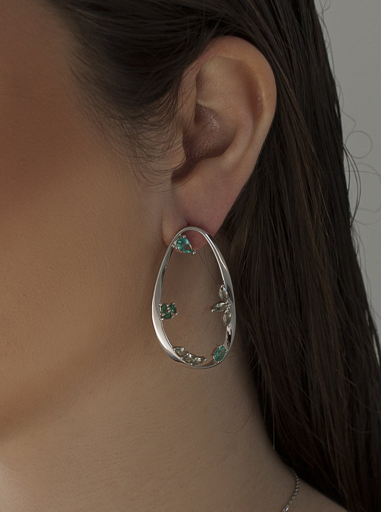 Original large silver earrings with green-toned gemstones