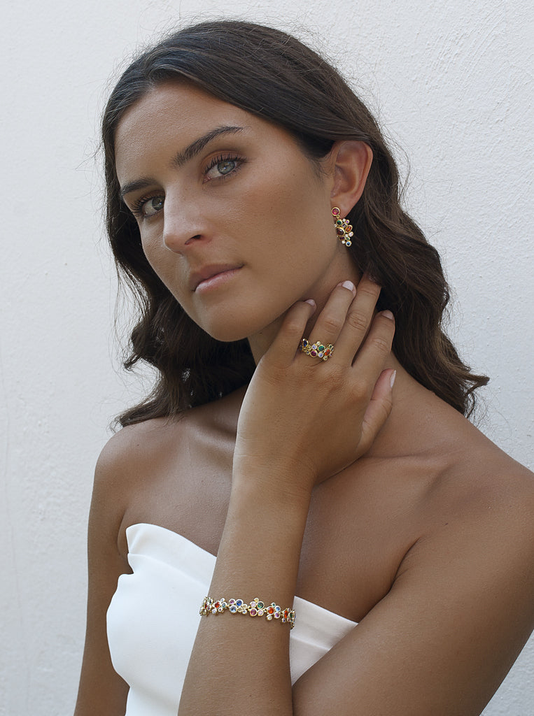 Anillo de plata bañado en oro multicolor con circonitas