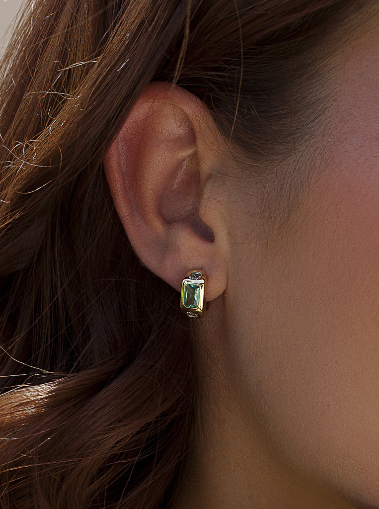 Pendientes largos de plata dorados aurora lila con circonitas y talla baguette