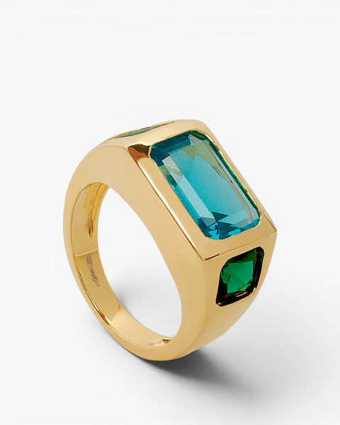 Anillo sello de plata bañado en oro con piedras aguamarina y  verde