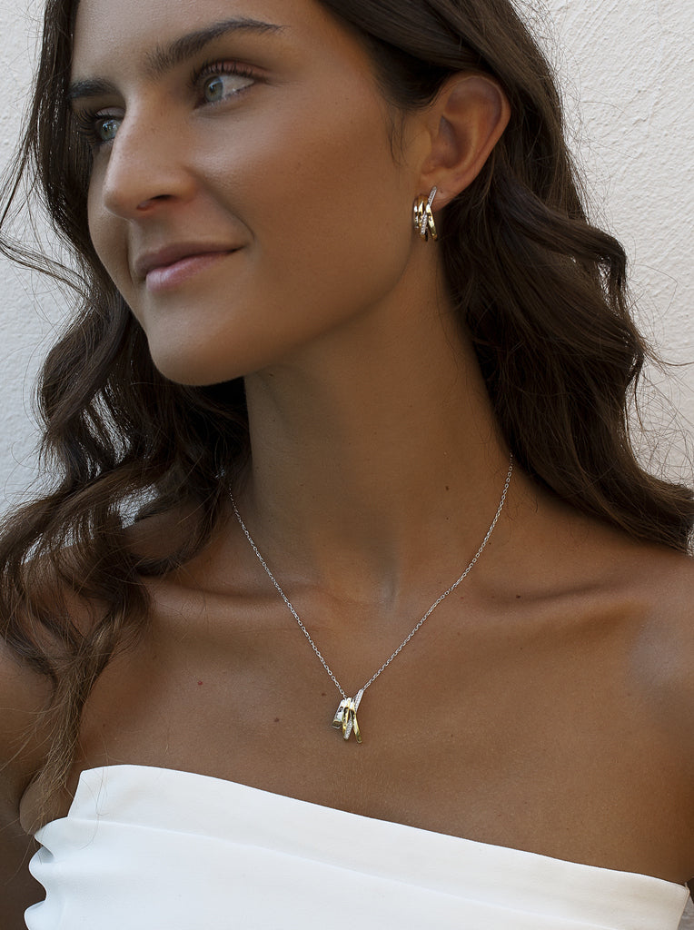 Two-tone silver necklace with original design cubic zirconia.