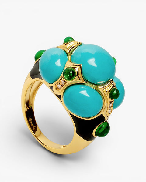 Anillo de plata  bañado en oro con esmalte negro y piedras turquesa