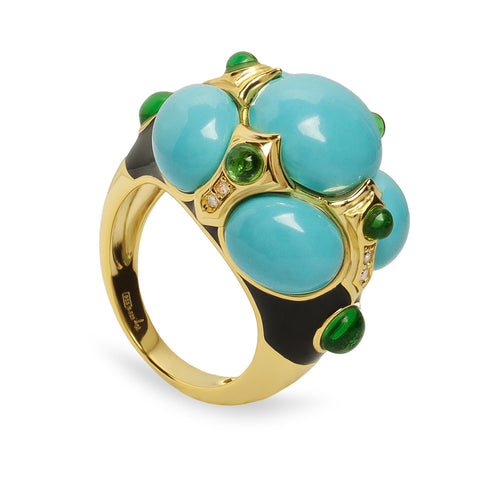 Anillo de plata  bañado en oro con esmalte negro y piedras turquesa