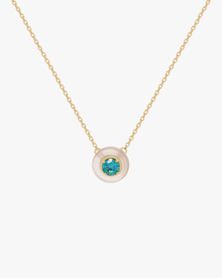 Collier doré avec pendentif disque nacré et turquoise