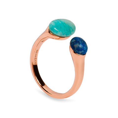 Anillo abierto de plata tono oro rosa con piedras azules