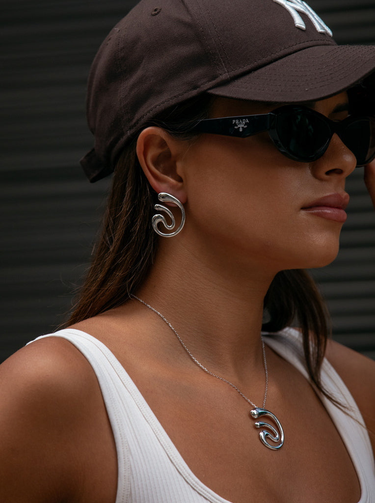 Original silver earrings with a spiral design
