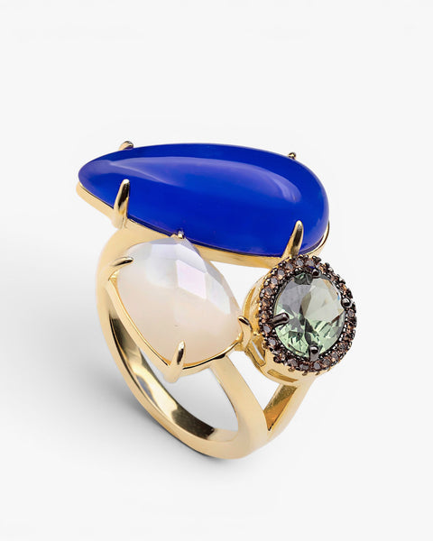 Gilded silver ring with a blue cabochon stone and green detail