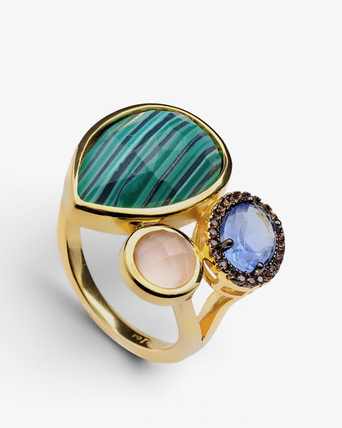 Silver ring with malachite, rose quartz, and blue crystal with a gold-finish halo