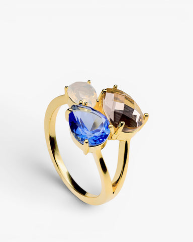 Gold-plated silver ring with triple blue, white, and champagne stones