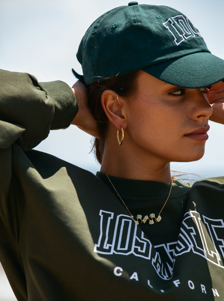 Boucles d'oreilles pendantes en argent plaqué or d'une élégance minimaliste