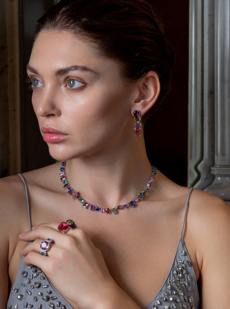 Anillo abierto de plata con piedras fucsia lila verde y turquesa