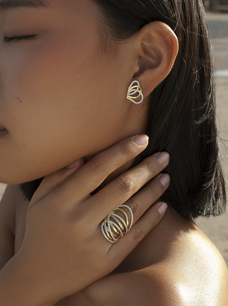 Pendientes de plata bicolor con circonitas diseño entrelazado