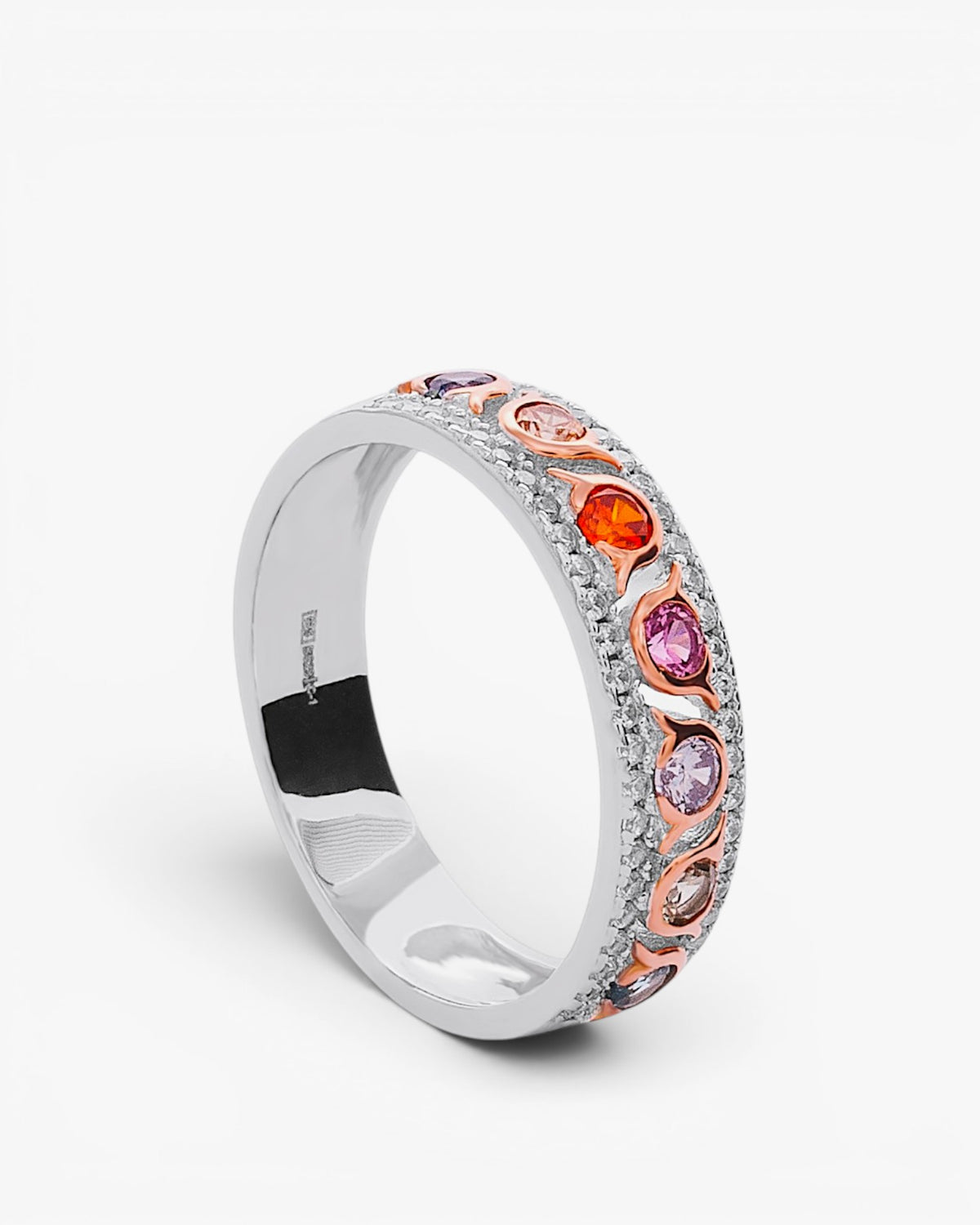 Anillo de plata bicolor con piedras de colores y circonitas