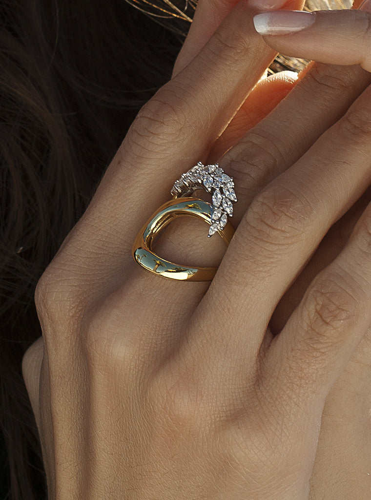 Anillos de plata bañada en oro bicolor con circonitas – diseño envolvente