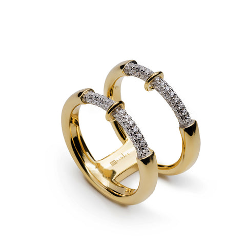 Anillo abierto bicolor de plata bañada en oro con circonitas